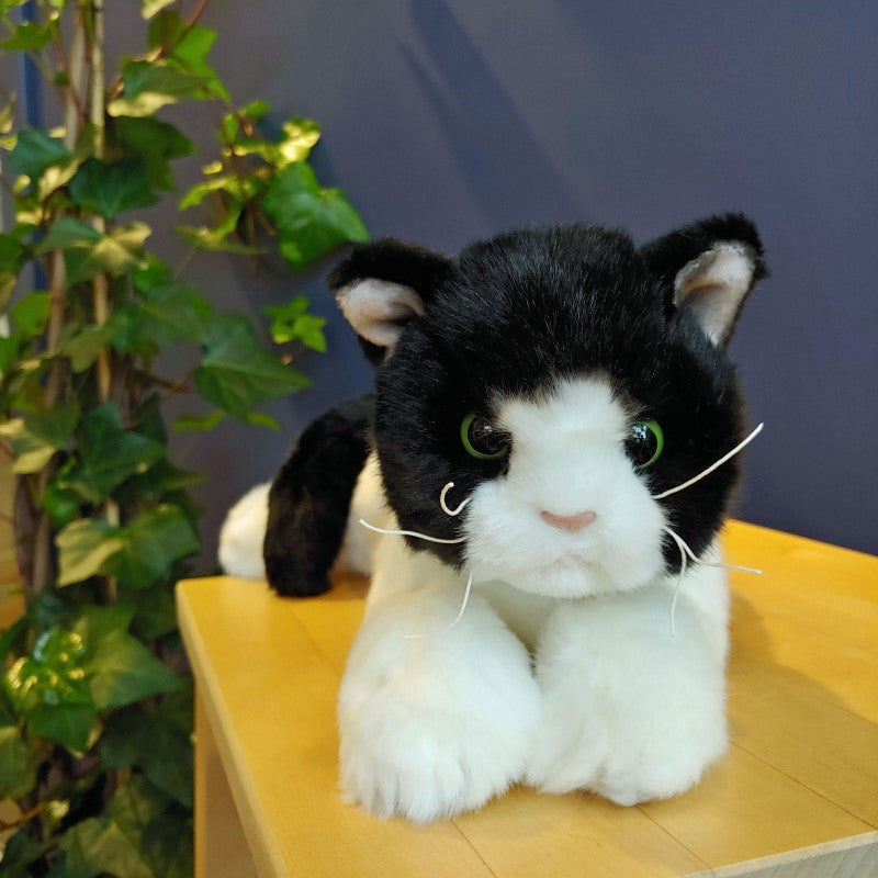 Petite peluche de chat noir et blanc